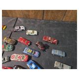 Collection of NASCAR Diecast Racing Cars with Cadbury Tin