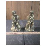 Metal bookends boy reading