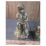 Metal bookends boy reading