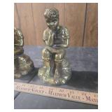 Metal bookends boy reading