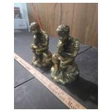 Metal bookends boy reading