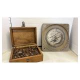 Router bits in wooden case and saw blade