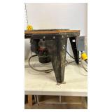Craftsman Router Table with inverted router, plus a bag of sawdust