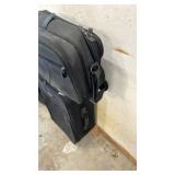 Small Jaguar suitcase and Samsonite Carry-on