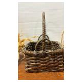 Baskets, one with corn attached