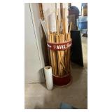 Hills Dowels Display Rack and Assorted Dowels, some with plastic pieces and a roll of plastic