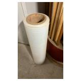 Hills Dowels Display Rack and Assorted Dowels, some with plastic pieces and a roll of plastic