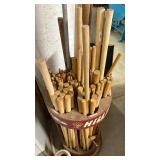 Hills Dowels Display Rack and Assorted Dowels, some with plastic pieces and a roll of plastic