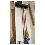 Two Large Brooms and one smaller broom