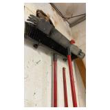 Two Large Brooms and one smaller broom