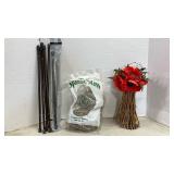 Six tension rods. Spanish moss and faux flower decoration