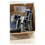 Box of Metal Brackets 5 inches by 4 inches
