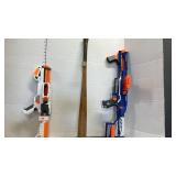 Nerf guns and a bat