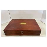 Mismatched flatware in wooden box