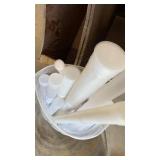Wooden organizers, plastic tubes and metal basin