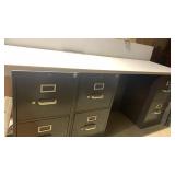 3 metal file cabinets 29x15 with a counter/desk top 79x24
