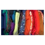 Fabric, oranges, paisley blue and more in bin