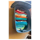 Fabric , green, blue, orange spider web and more in bin