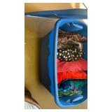 Fabric, reds, browns and more in bin
