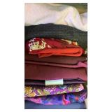 Mostly dark colored fabrics and one light pink