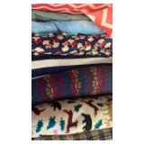 Fabrics , some plaid and strips and animals designs