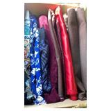 Fabrics, mostly dark, paisley and blue and white flowers