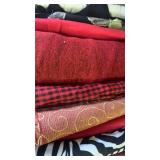 Fabrics, mostly dark colors and patterns