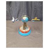 Mechanical Orbiting Airplanes with Globe Base