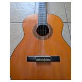 Vintage Classical Guitar with Ornate Rosette