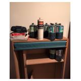 Mixed Lot of Coleman and Propane Fuel Canisters and shelf for storage