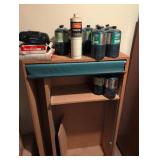 Mixed Lot of Coleman and Propane Fuel Canisters and shelf for storage