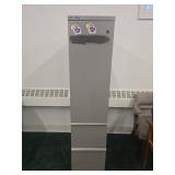 Tall Gray Metal Storage Cabinet with KU Jayhawk Stickers