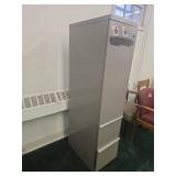 Tall Gray Metal Storage Cabinet with KU Jayhawk Stickers