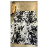 70x40" White and Black Splotches Area Rug