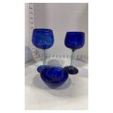Kosta Boda cobalt blue glass votive holder and 2 handblown blue glass wine glasses