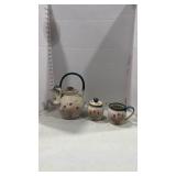 Signed pottery tea pot with sugar and creamer