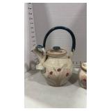Signed pottery tea pot with sugar and creamer