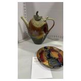 Hand crafted ceramic tea pot and Prairie Fire pottery plate