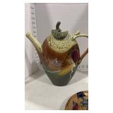 Hand crafted ceramic tea pot and Prairie Fire pottery plate