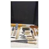 Wooden and wooden handled kitchen utensils
