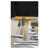 Wooden and wooden handled kitchen utensils