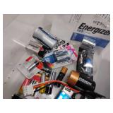 Assorted Batteries in Storage Tote