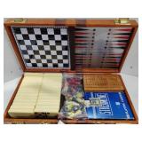 Games.  Cribbage Games and a Multi Travel Game Set.  Set has Chess, Dominoes and More