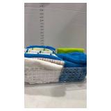 Kitchen towels in plastic basket storage