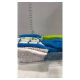 Kitchen towels in plastic basket storage