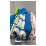 Kitchen towels in plastic basket storage