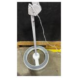 Adjustable magnifying LED lamp on wheels