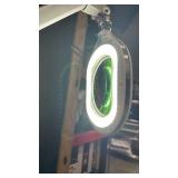 Adjustable magnifying LED lamp on wheels