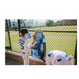 Navy blue and red Easton rolling baseball equipment bag featuring multiple compartments, padded straps, and decorative star pattern accents. Durable wheeled design ideal for transporting sports gear. 