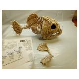 JOYIN Halloween Skeleton Lantern Fish with LED Eye Plastic Bones for Halloween Decoration Party Photo Prop, Graveyard Decor, Indoor Outdoor Spooky Scene(10.2â *5.5â *3â) - Retail: $22